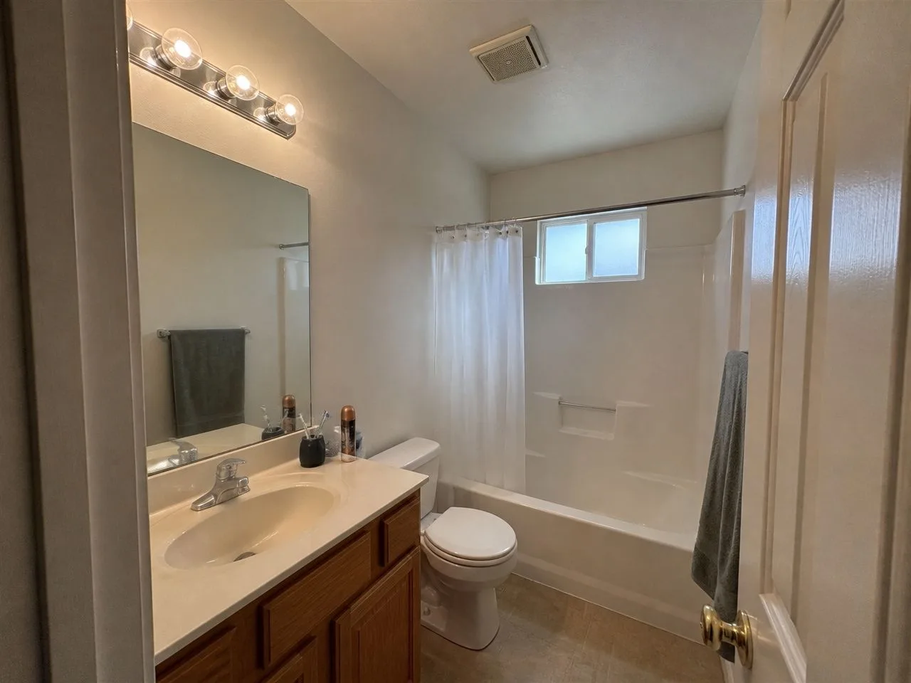 Bathroom before the AI redesign, an ordinary phone photo