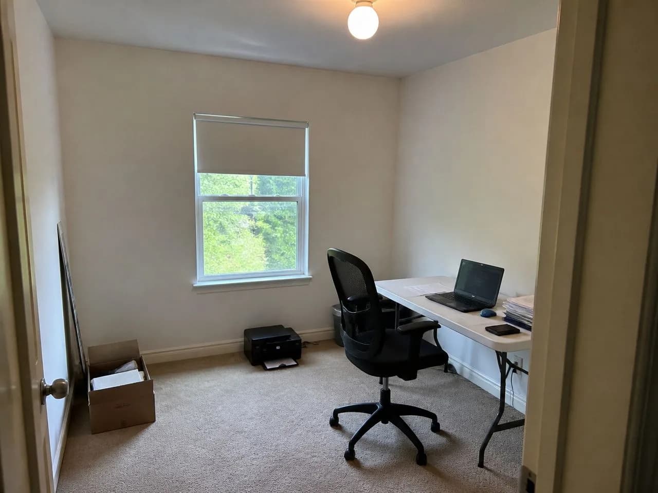 Home office before the AI redesign, an ordinary phone photo