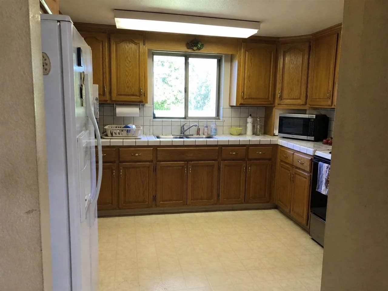 Kitchen before the AI redesign, an ordinary phone photo