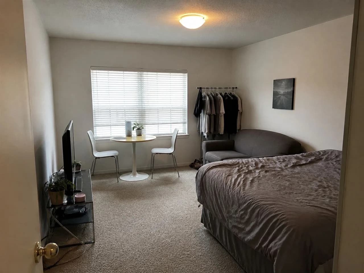 Studio apartment before the AI redesign, an ordinary phone photo