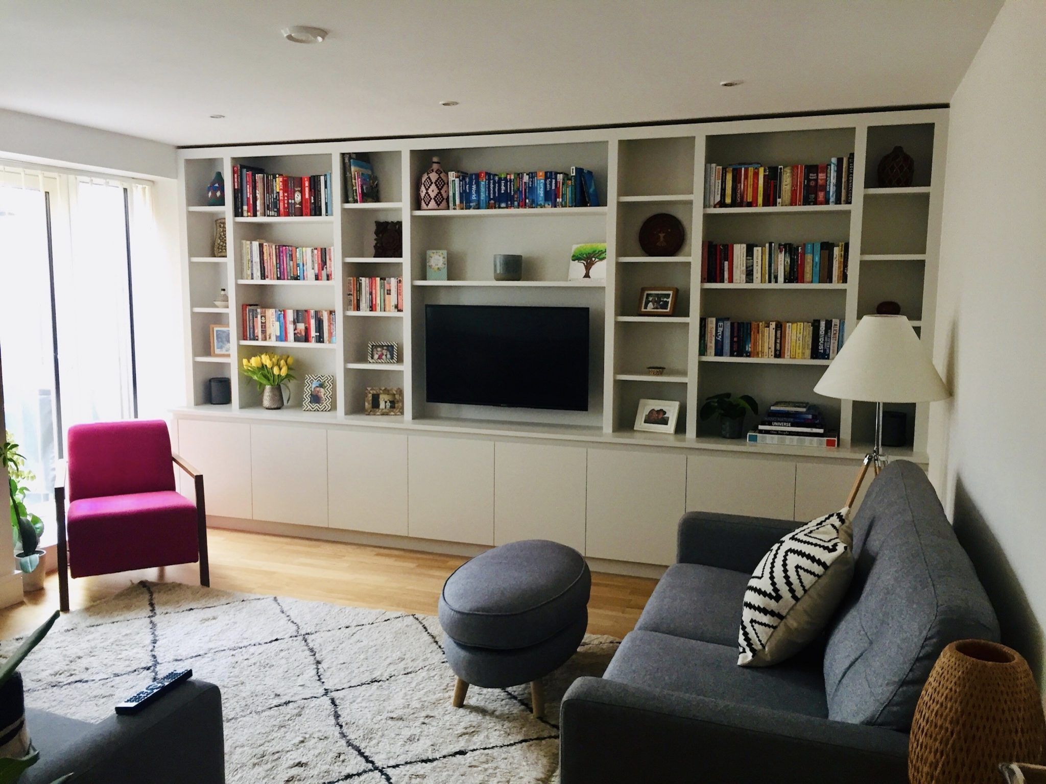 Placeholder for organized living room with storage solutions